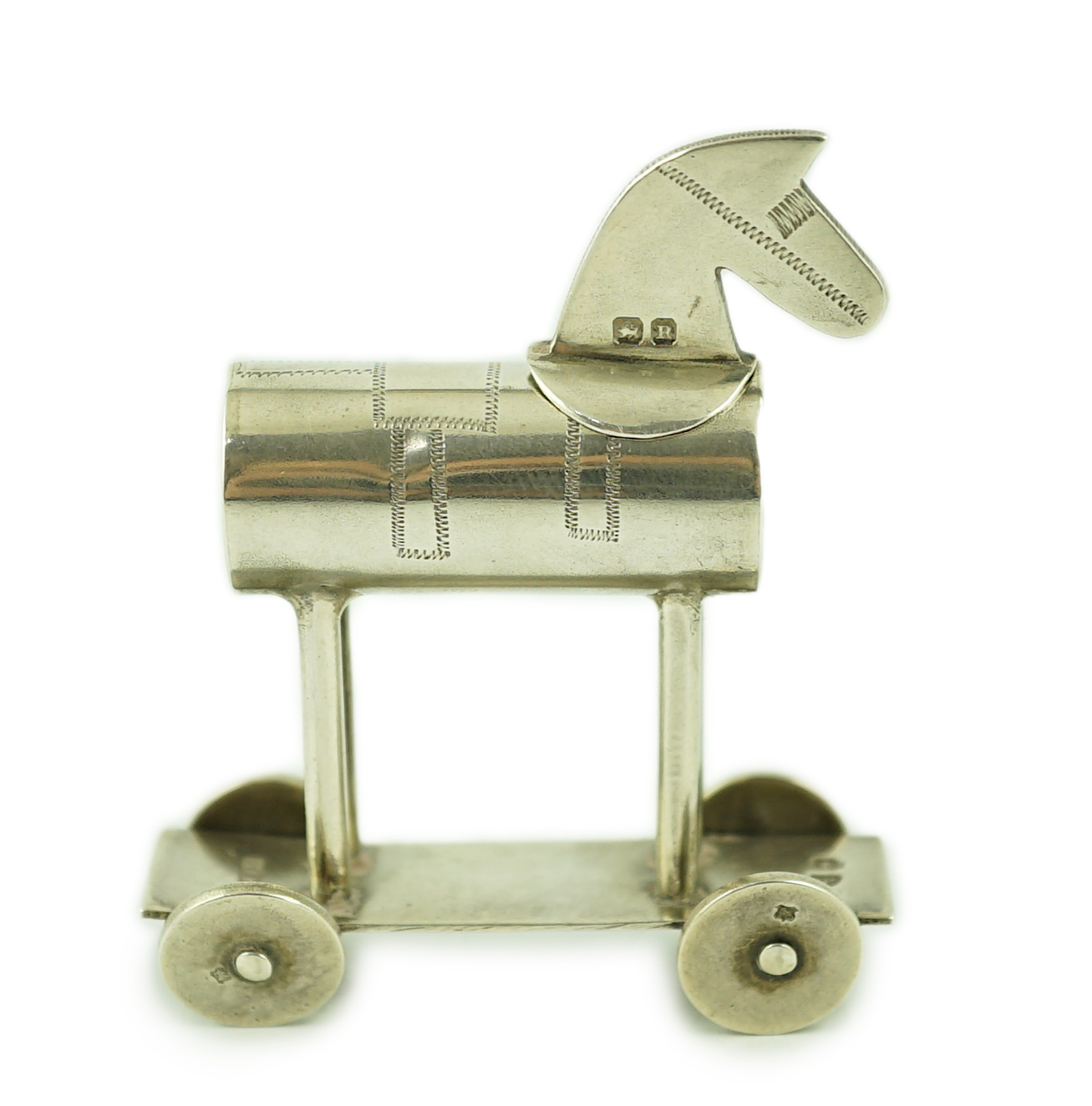 A late Victorian novelty silver cayenne pepper condiment, modelled as a Hobby horse, by Saunders & Shepherd